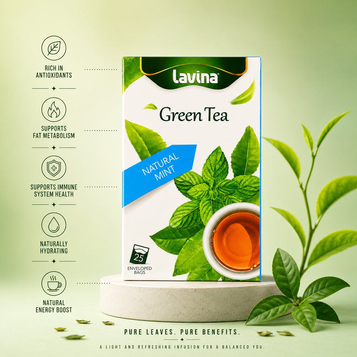 A box of Lavina Green Tea with Natural Mint flavor stands on a light stone pedestal against a soft green background. The packaging features illustrations of green tea leaves and a cup of amber tea.
